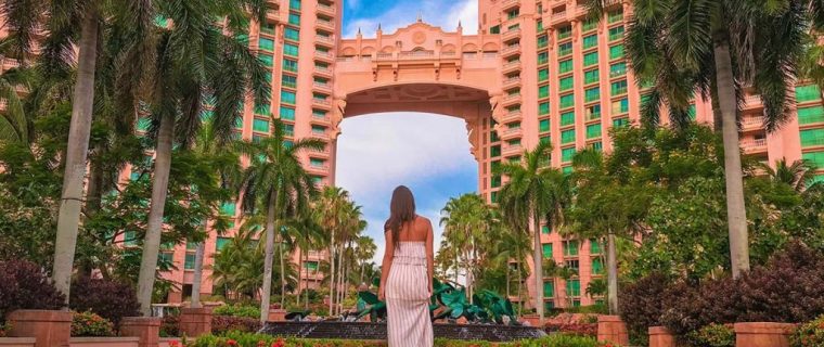 Things-to-do-in-Atlantis-Bahamas-in-a-Day-Girl-Looking-up-at-Resort-1024x742